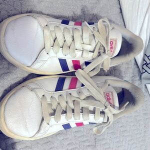 Adidas shoes. There is some marks on the right shoe.